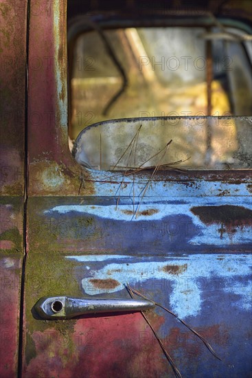 Colorful door of abandoned truck