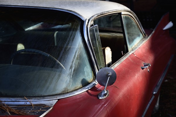 Abandoned red car