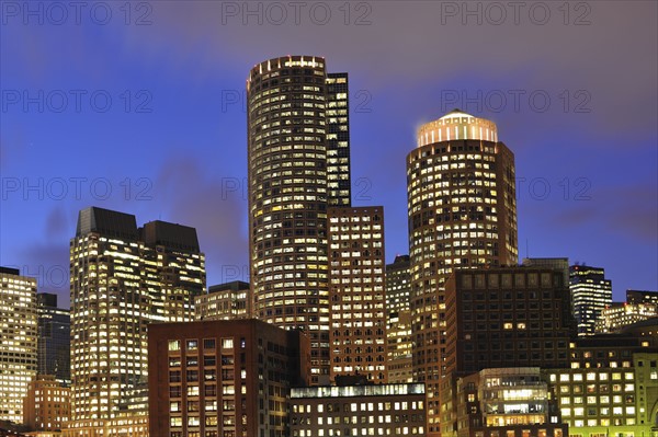 Illuminated financial district at dusk