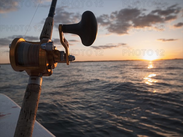 Close-up of fishing rod and reel