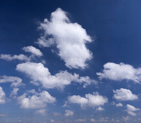 Clouds against blue sky.