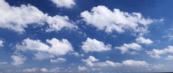 Clouds against blue sky.