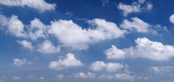 Clouds against blue sky.