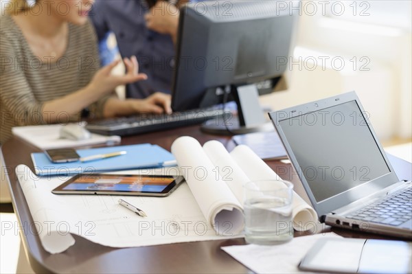 Man and woman working in office.