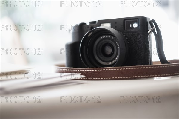 Digital camera on desk.