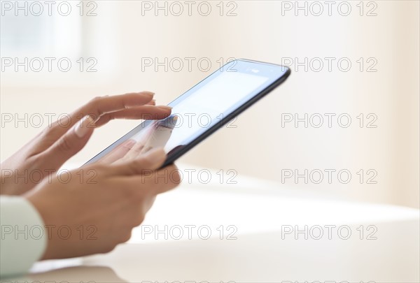 Hands using tablet pc.