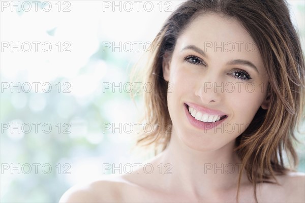 Portrait of beautiful woman with brown hair.