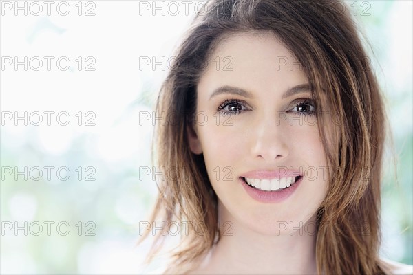 Portrait of beautiful woman with brown hair.