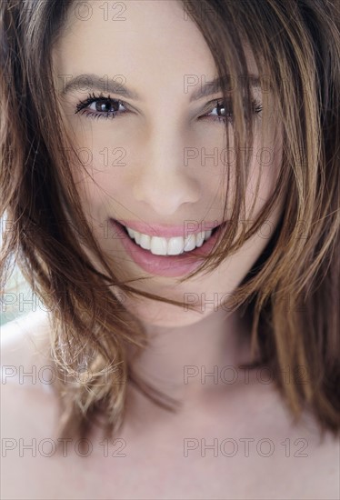 Portrait of beautiful woman with brown hair.
