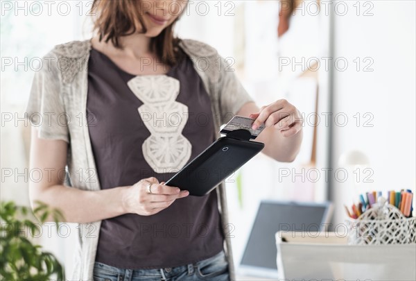 Female fashion designer in her office.