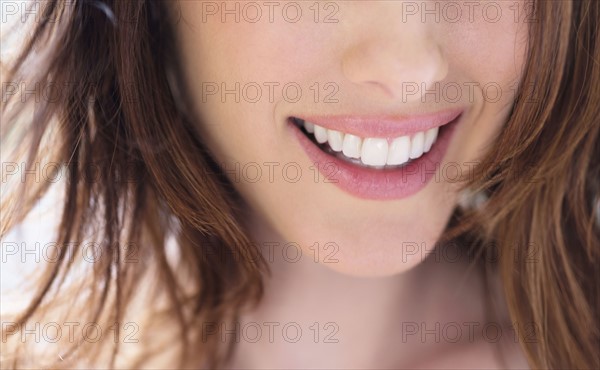 Close up of smiling woman.