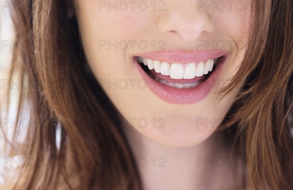 Close up of smiling woman.