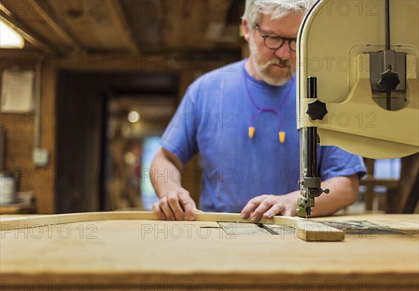 Carpenter working in workshop