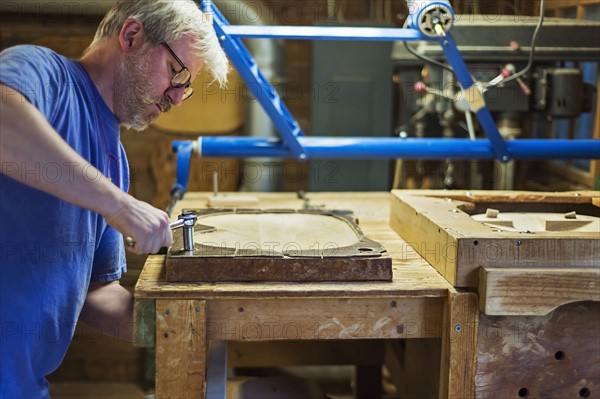 Carpenter working in workshop