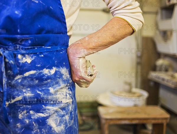 Female potter in studio