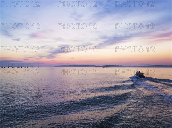 Fishing boat heading towards harbor