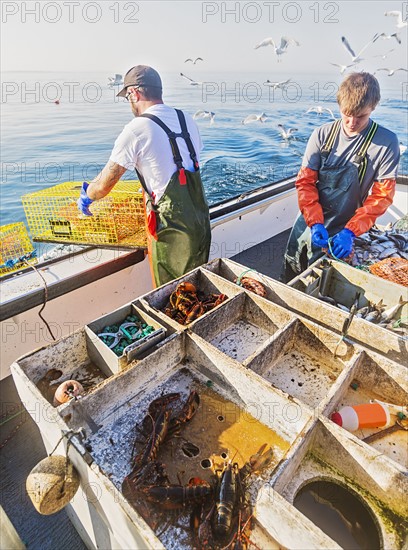 Fishermen working on boat