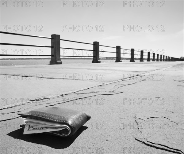 Wallet on empty promenade