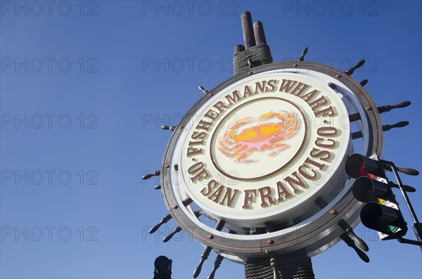 Commercial sign against clear sky