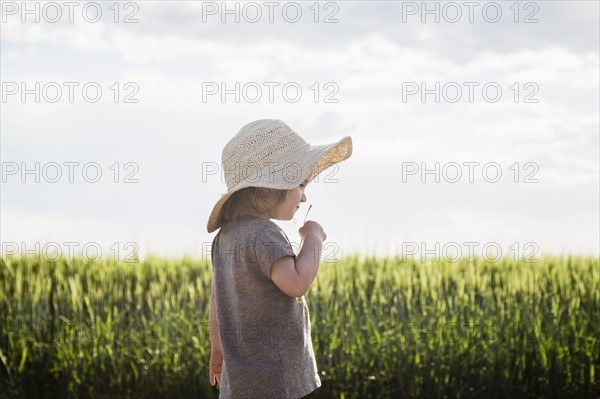 Portrait of girl in straw hat