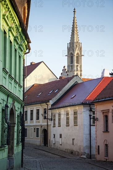 Townhouses with church tower in background