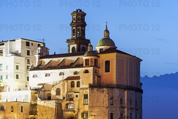 Townhouses and tower at dusk