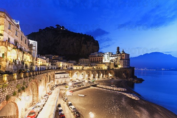 Town on coastline at dusk