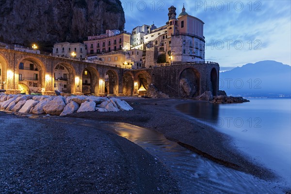 Beach and town at dusk