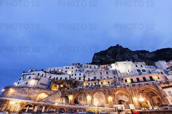 Illuminated town at dusk