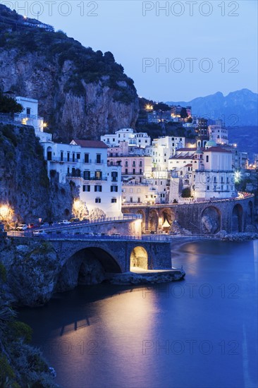 Town on coastline at dusk