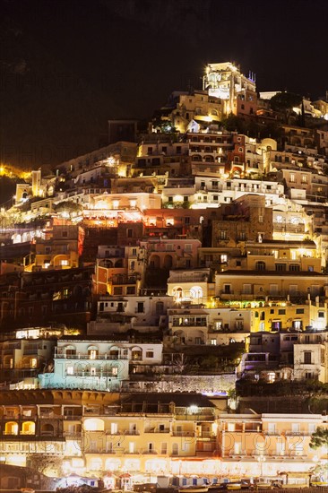 Residential buildings on hill at night