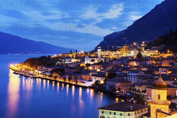 Illuminated cityscape at dusk