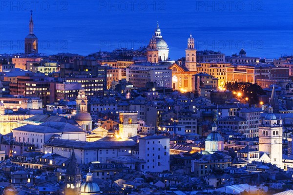 Cityscape with Santa Maria Church illuminated at dusk