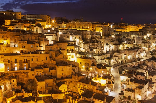 Illuminated city buildings at night