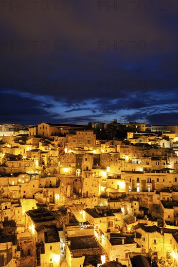 Illuminated city buildings at night