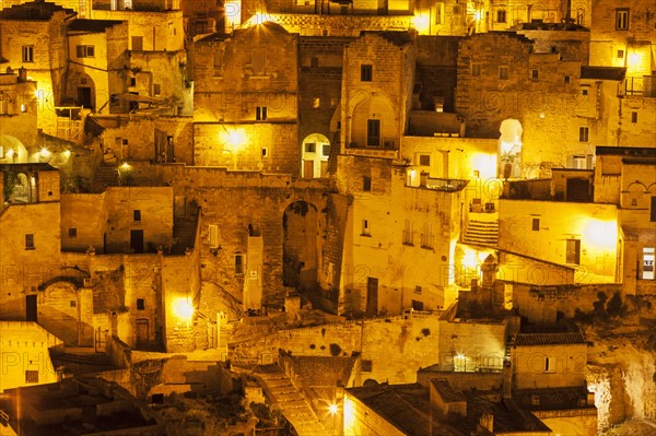 Illuminated city buildings at night