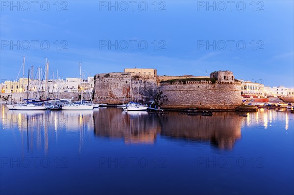 Marina and Castello Angiono at sunrise