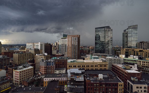 Storm clouds over city