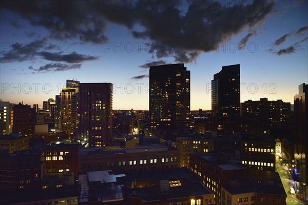 Dusk lights over cityscape