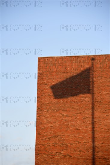 Shadow of flag on wall