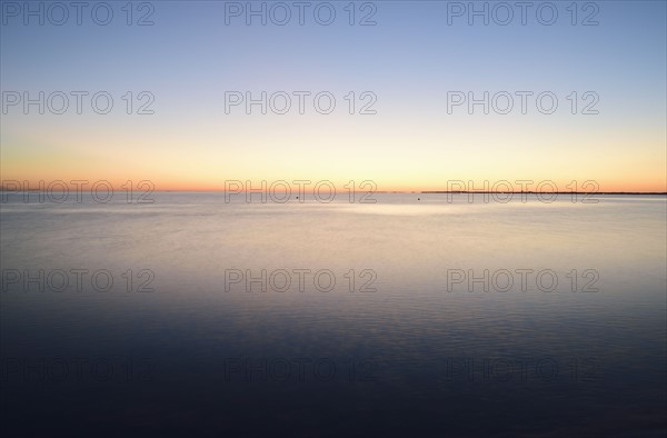 Horizon over water at dusk