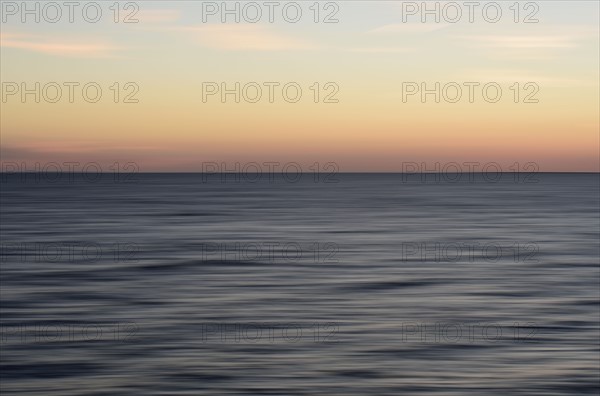 Horizon over water at dusk
