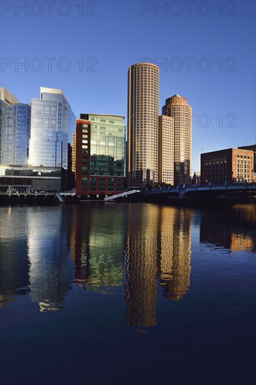 City waterfront reflected in Fort Point Channel