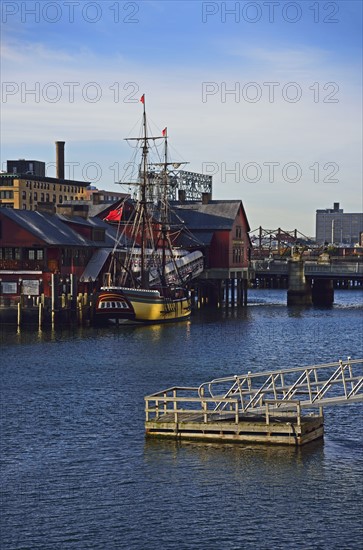 Tall ship moored in harbor