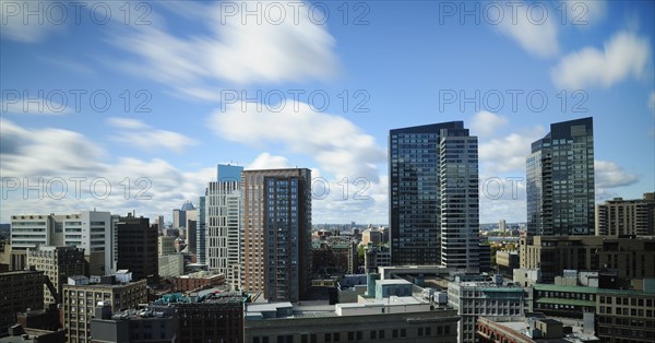 Clouds over modern city