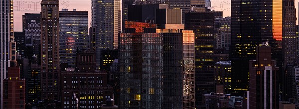 Skyscrapers in New York City at sunset. New York City, New York, USA.