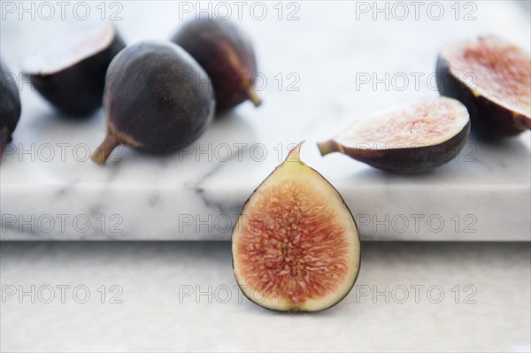 Cross section of figs on marble