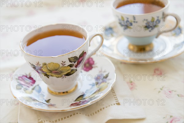 Tea in tea cup on table