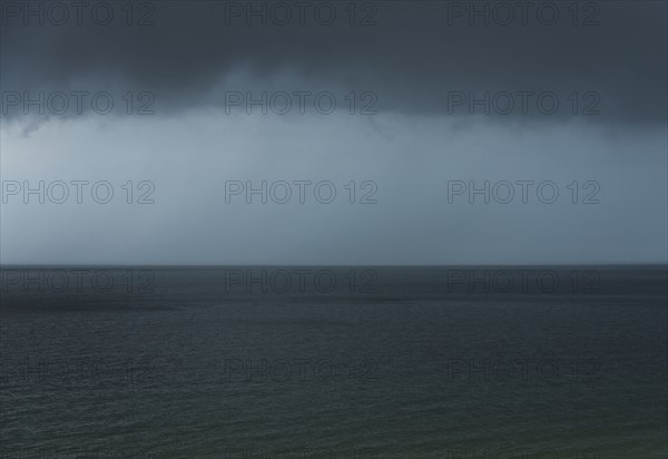 Storm clouds over sea