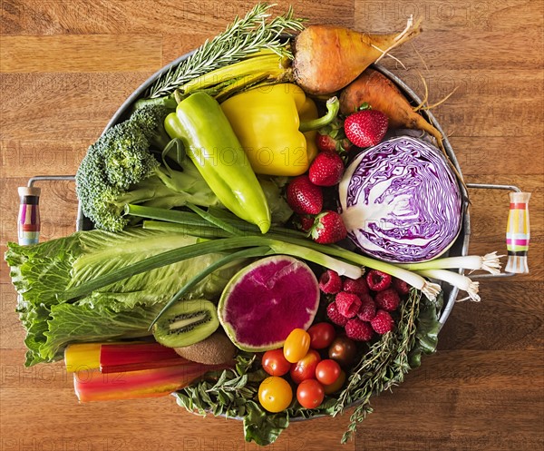 Fruit and vegetables and herbs on tray